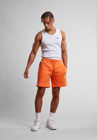 Regular Pantalon de sport Starter Black Label en orange