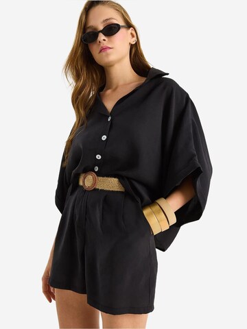 Pantalons de tailleur Bianco Lucci en noir