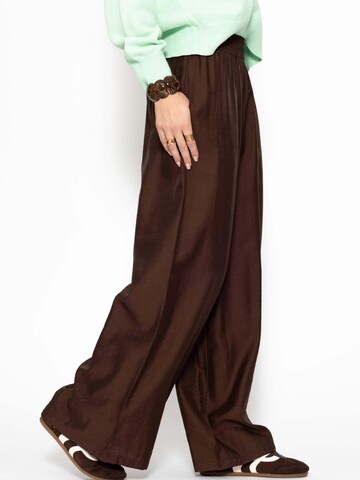 SASSYCLASSY Loose fit Trousers in Brown