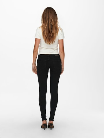 ONLY Skinny Jeans 'Coral' in Schwarz
