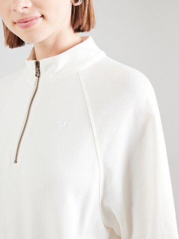 Felpa di Champion Authentic Athletic Apparel in bianco
