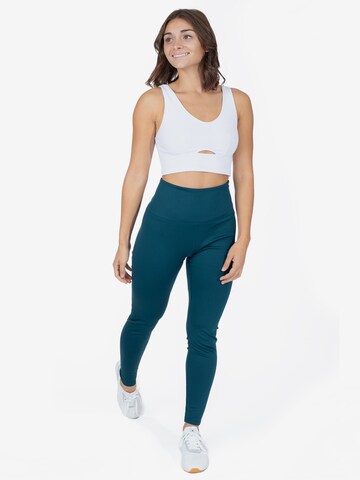 Skinny Pantaloni sportivi di Spyder in verde