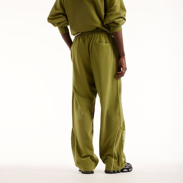 Pantalon 'Trackside' new balance en vert
