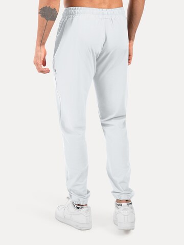 Effilé Pantalon de sport 'Delian' Smilodox en gris
