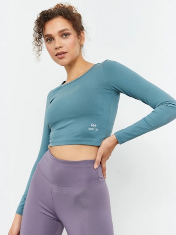 Top sportivo di Tommy Life in blu