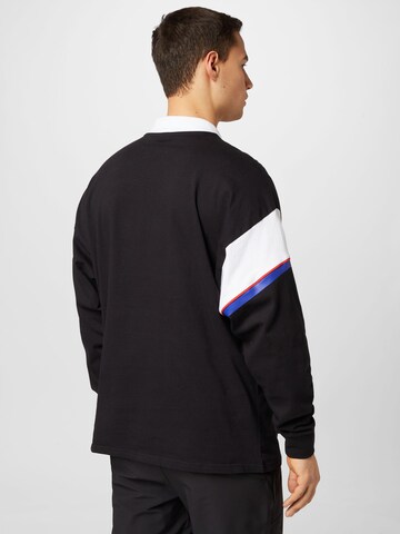 PUMA Poloshirt in Schwarz