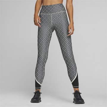 PUMA Skinny Sportbroek 'Concept' in Zwart: voorkant