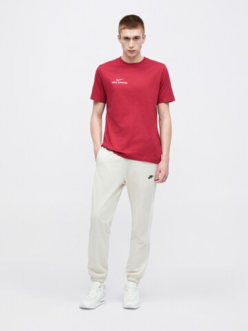 Nike Sportswear - Camiseta 'OFFICIAL' en rojo