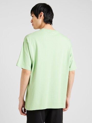 PUMA T-shirt 'Better Classics' i grön