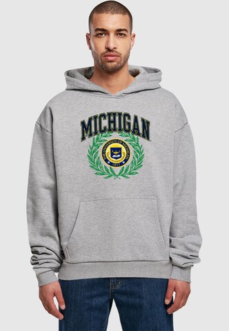 Merchcode Sweatshirt 'Michigan University - Artes Scientia Veritas Ultra' in Grau: Vorderseite