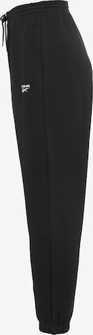 Tapered Pantaloni sportivi di Reebok in nero