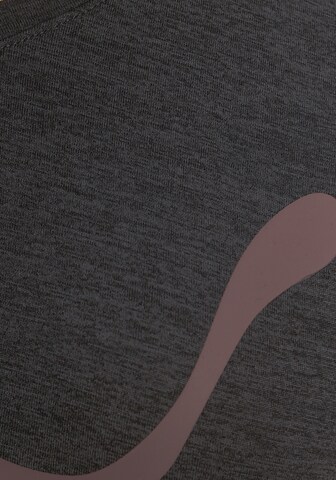 PUMA Funktionsshirt in Schwarz