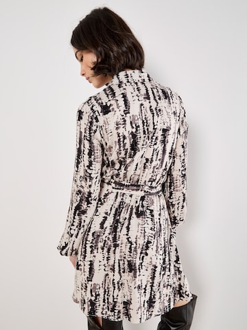 Robe Apricot en blanc