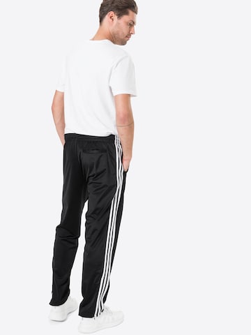 ADIDAS ORIGINALS Regular Broek 'Firebird' in Zwart