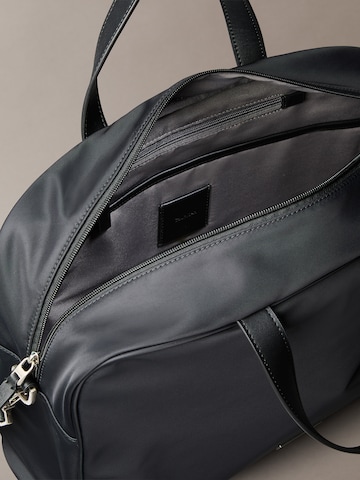 Sac d’ordinateur portable Calvin Klein en noir