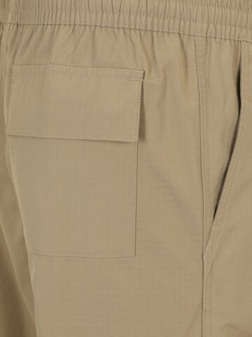 Regular Pantaloni cu buzunare de la Nike Sportswear pe bej