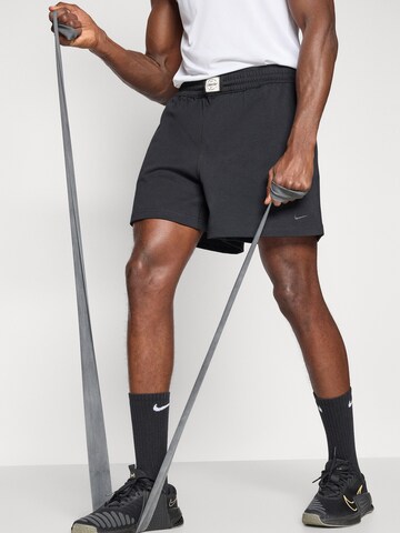 NIKE Ohlapna forma Športne hlače | črna barva