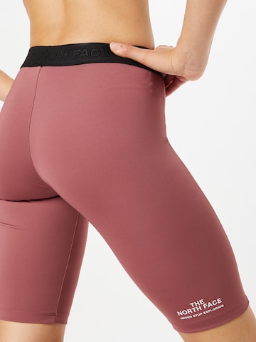 THE NORTH FACE Skinny Workout Pants in Red