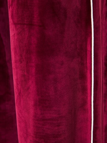 Wide leg Pantaloni di Funky Buddha in rosso