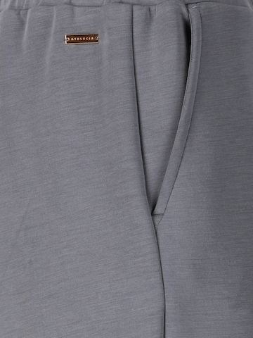 Athlecia - Tapered Pantalón deportivo 'Jacey' en gris