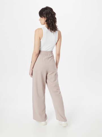 ABOUT YOU Wide leg Pants 'Lucky' in Beige