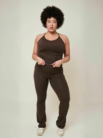 Copenhagen Cartel Regular Trousers ' Art ' in Brown: front