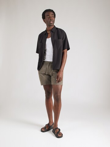 Abercrombie & Fitch Normalny krój Spodnie w kolorze zielony