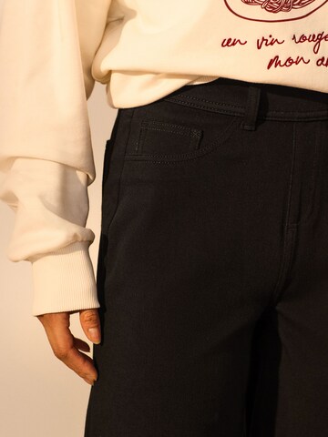 Next Wide Leg Jeggings in Schwarz