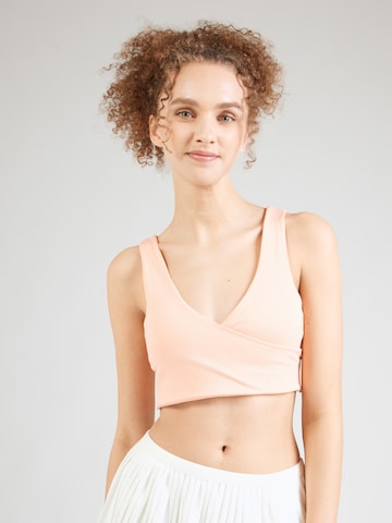 Reebok Bustier Športni nederček 'LUX PEACHED' | roza barva: sprednja stran
