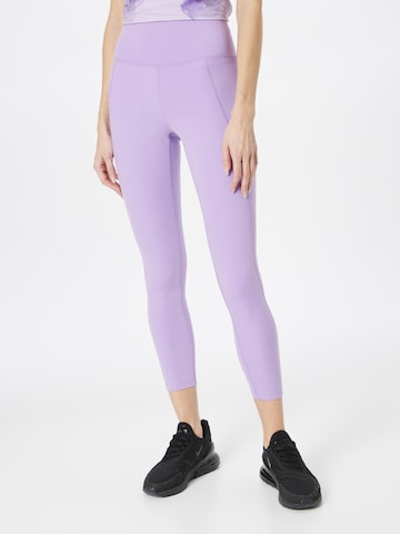 Girlfriend Collective Skinny Workout Pants in Purple: front