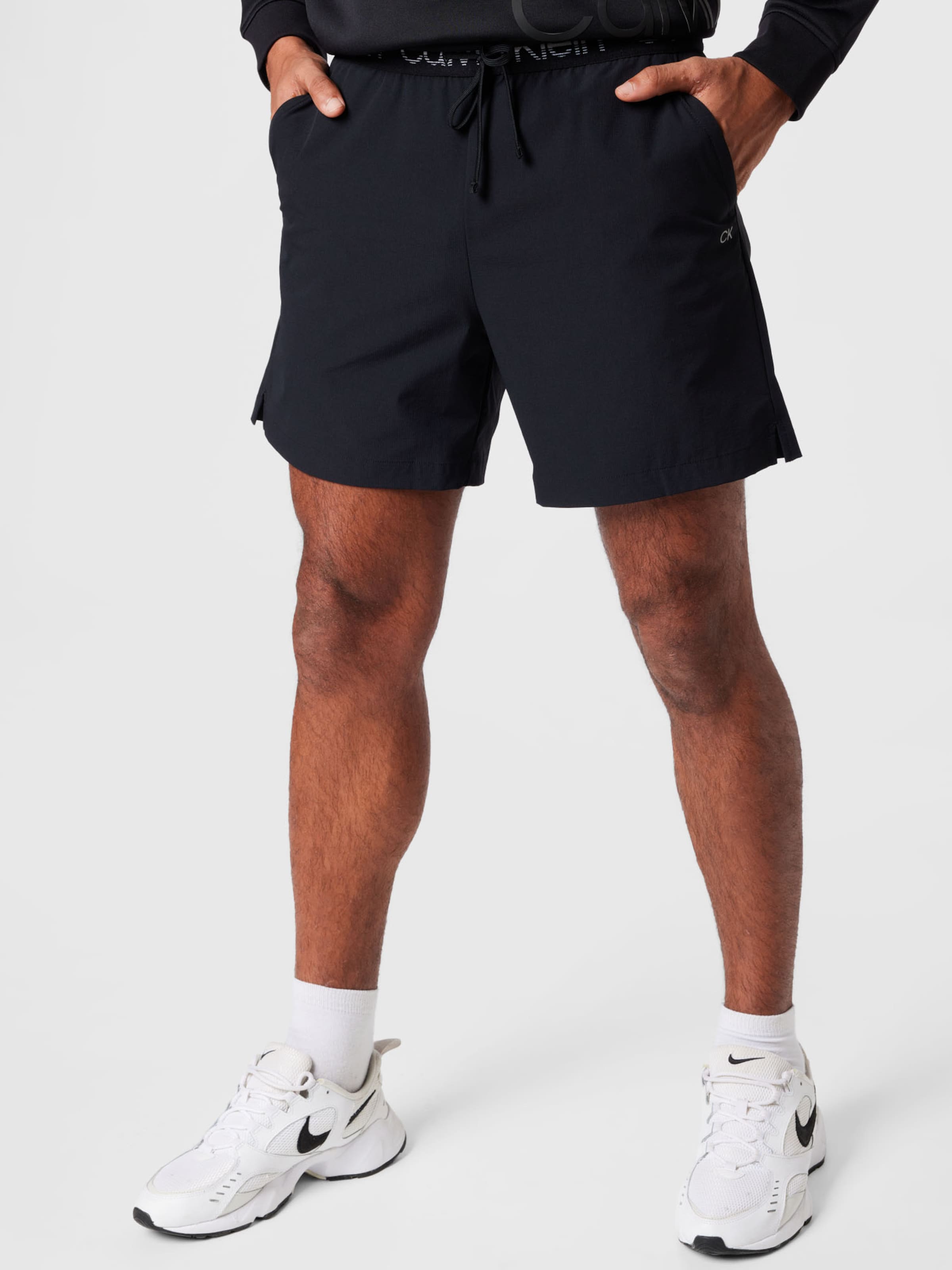 Tipi di sport Uomo Calvin Klein Performance Pantaloni sportivi in Nero 