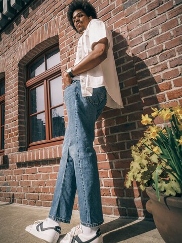 Loosefit Jean '555™ Relaxed Straight Jeans' LEVI'S ® en bleu