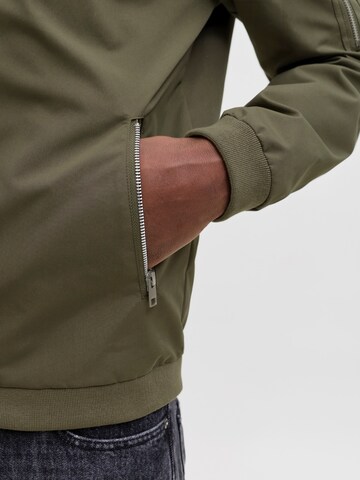 JACK & JONES Regular fit Between-Season Jacket 'JJERUSH' in Green