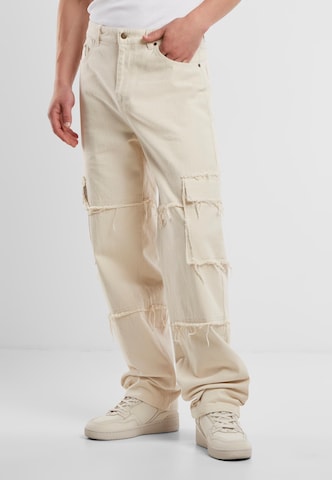 Baggy Pantalon cargo Karl Kani en beige
