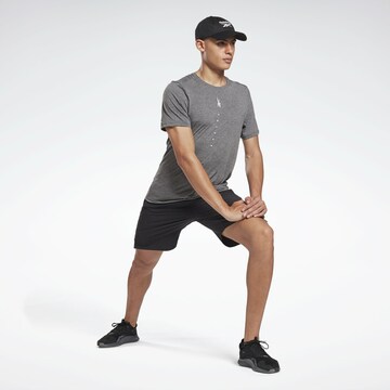 Regular Pantaloni sport de la Reebok pe negru: față