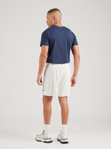 ELLESSE Loose fit Trousers 'ONORATI' in White