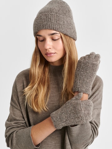 TATUUM - Guantes con dedos en marrón: frente