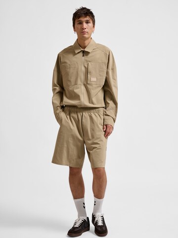 Hummel Loose fit Trousers 'Sorona' in Brown