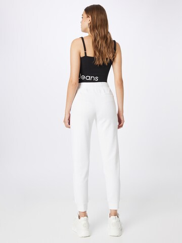 Effilé Pantalon Calvin Klein en blanc