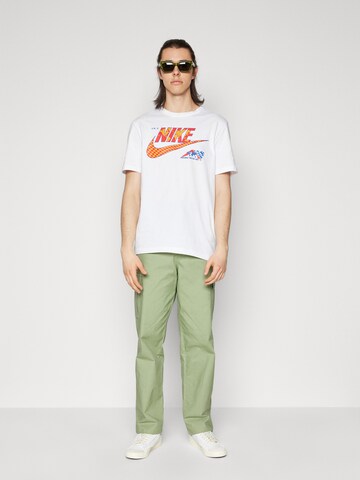 Nike Sportswear Loosefit Gargohousut 'CLUB' värissä vihreä