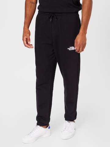 THE NORTH FACE Дънки Tapered Leg Панталон 'ESSENTIAL' в черно: отпред