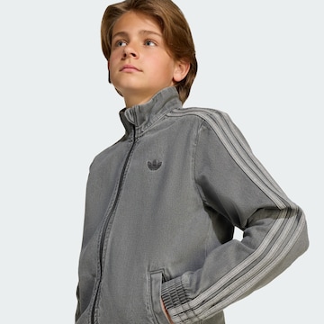 ADIDAS ORIGINALS - Chaqueta de entretiempo 'Firebird' en gris