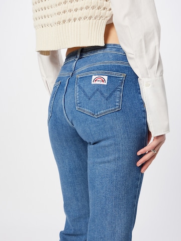 WRANGLER Flared Jeans in Blau