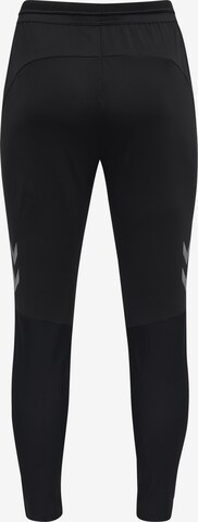 Coupe slim Pantalon de sport Hummel en noir