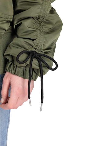 ALPHA INDUSTRIES Between-Season Jacket 'CWU MA-1' in Green