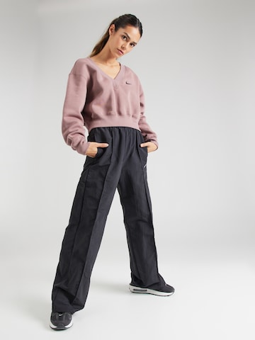 Wide leg Pantaloni cu dungă de la Nike Sportswear pe negru