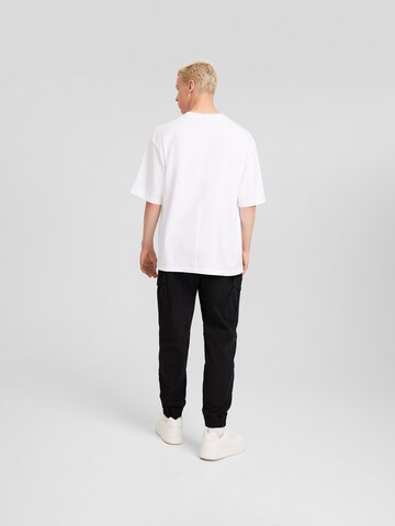 Bershka Tapered Cargo nadrágok - fekete