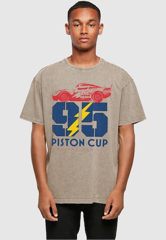 ABSOLUTE CULT Shirt 'Cars - Piston Cup 95' in Bruin: voorkant