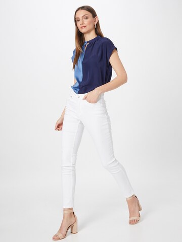 Sisley - Blusa em azul