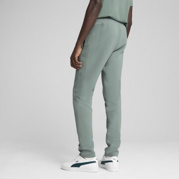 PUMA Slim fit Workout Pants 'Evostripe' in Green